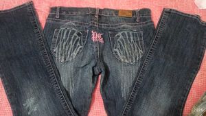 Distressed Denim Jeans