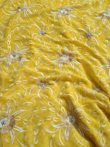 Yellow Sareewith Silver Sides