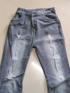 Stretchable Ripped Flare Jeans
