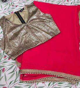 Pink Saree with Golden Blouse