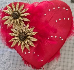 Red heart shaped satin box
