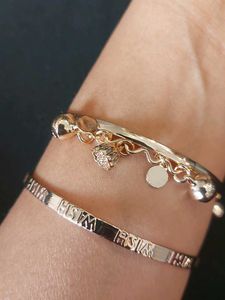 Set Of 2 Bangle Bracelets Gold Toned