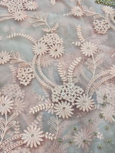 Peach Embroidery Net Sari