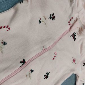 Beautiful Peach Christmas Themed RLE Sleepsuit