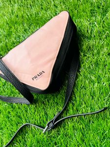 Prada original iconic triangle sling bag