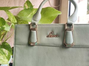 Handbag With Additional Sling Strap