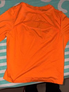 Bright Orange Cutout Long Sleeve Top