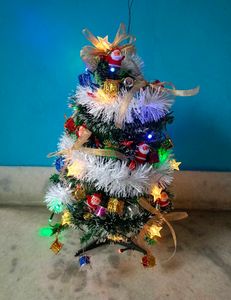 CHRISTMAS TREE WITH DECORATION MATERIAL