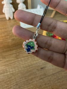 Handmade tomato and fish charms