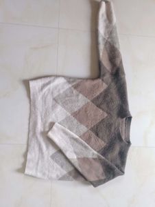 A Cropped Sweater Of Fabric Wool