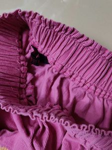 A beautiful pink skirt with acrylic fabric for sty