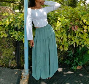 White Corset Top And Green Maxi Skirt