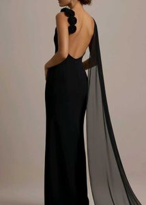 Elegant Black Gown with Cape Detail