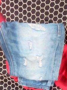 Ripped Light Wash Denim Jeans