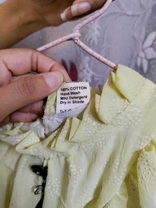 Chic Yellow Ruffle Front top | Swiss Dot Sheer Lon