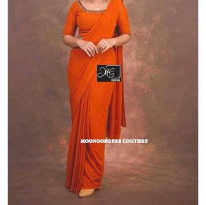 Elegant Brick Orange Saree with Embellished Blouse