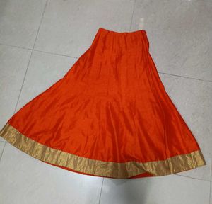 Ethnic Orange Skirt/ Lehenga With Golden Border