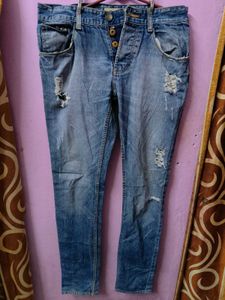 Ripped Blue Denim Jeans