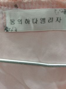 Girls Frock In Embroidered Net With White Beads.