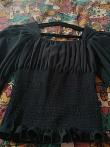 A Navy Blue Full Sleeve Top.
