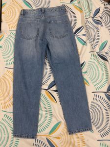 2 Pair Of Ripped Wide Leg And Straight Jeans