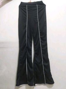 Combo of SSS black bootcut trousers and H&amp;M peach top