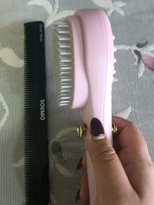 Self-Cleaning Hairbrush And Comb