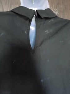 Black Sleeveless Top with Embellished Collar