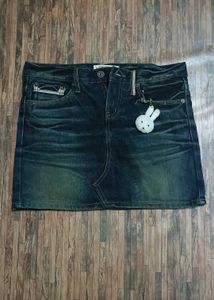 Dark wash denim mini skirt