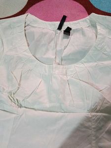 White Sleeveless Top