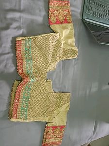 EMBELLISHED SILK LEHENGA IN PINK GREEN AND GOLDEN