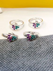 Pure silver toe ring in peacock design.