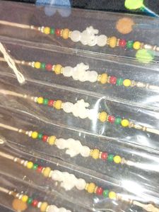 Beaded Rakhi Set Of 12 Peace