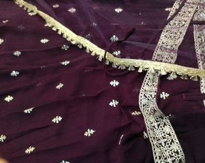 Elegant Purple Embroidered ethnic gowns