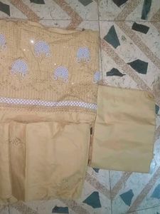 Embroidered dress material