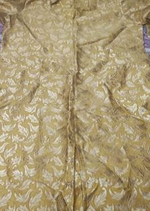 Golden Brocade kurta and net plazo with dupatta