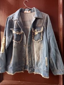 ripped denim jacket with sequins