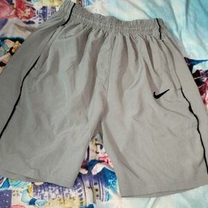 Nike Gray Athletic Shorts | Zipped Pockets