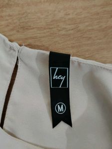 Chic Blush Pleated Bell Sleeve Top