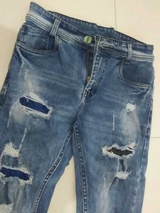 Distressed Denim Jeans