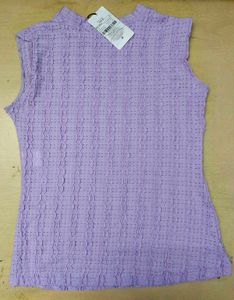 Medium Length Self Designed Eyelet Pattern Top.