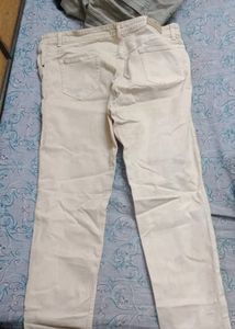 Airways white coloured jeans for waist size 34 a little bit of stain is there u can see in the 2nd photo