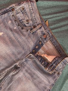 Distressed Denim Jeans