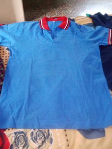 Blue Polo with Red and White Trim