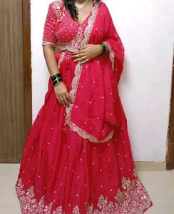 Elegant dark pink lehenga with Embellished Blouse