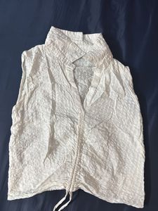 White Sleeveless Top