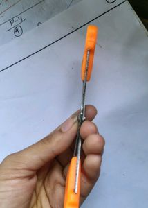 orange small scissor ✂️