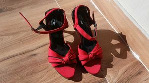 RICH FEEL RED AND BLACK HEELS