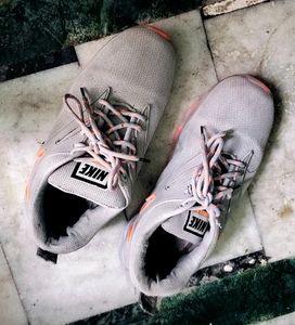 Boys Nike Grey And Orange Shoes