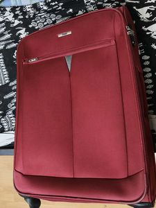 VIP Maroon Soft Textured With Wheels Trolly Bag